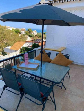 VillaEscondidaApartamento en chalet con vista abierta al mar